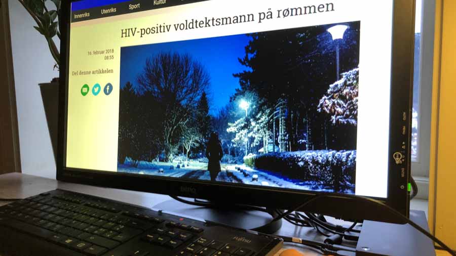 Bilde av PC-skjerm med artikkelen med overskrift "HIV-positiv voldtektsmann på rømmen"
