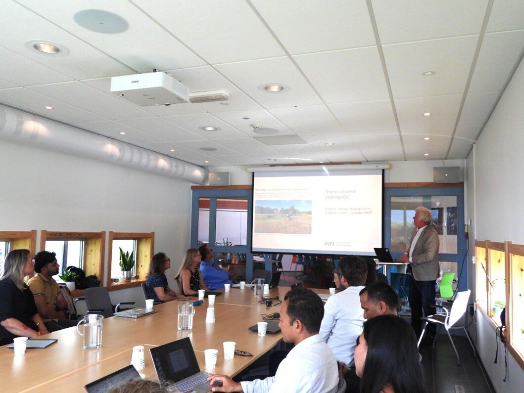A seminar is being held in a meeting room