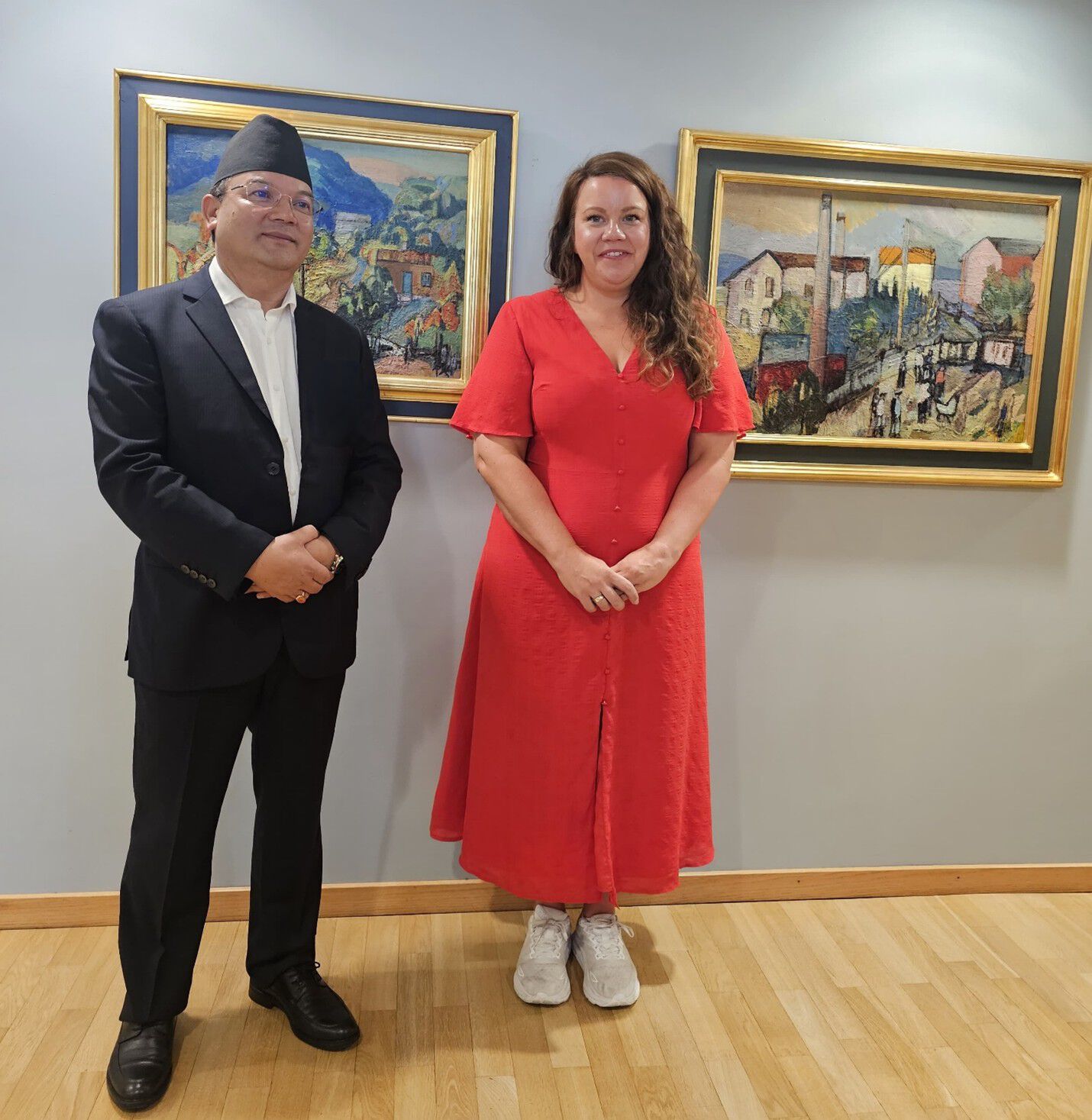 Minister and politician are standing together