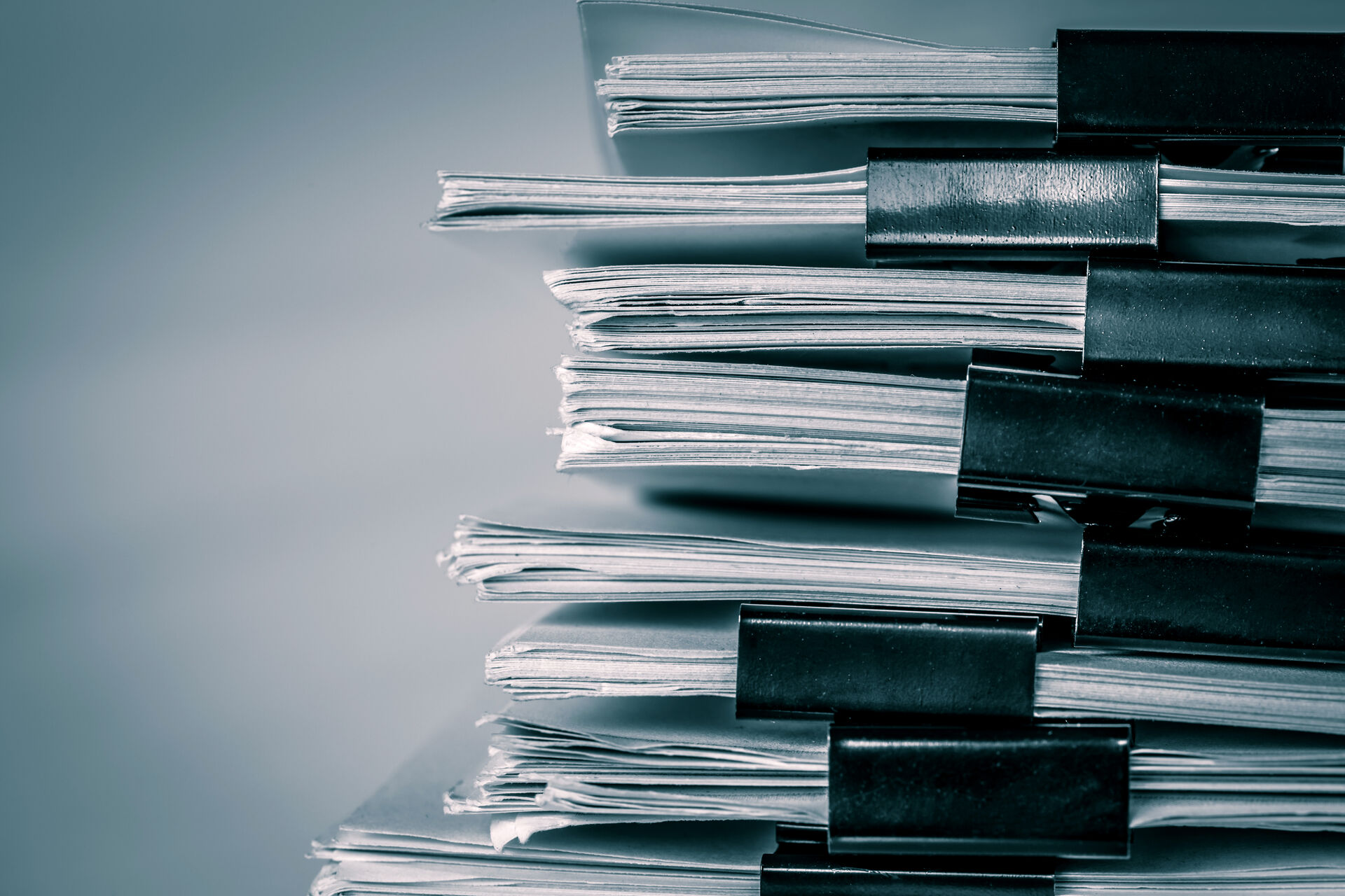 Picture shows a bunch of paper reports to illustrate that the link refers to a pdf version of the quality report (Photo: Colourbox)