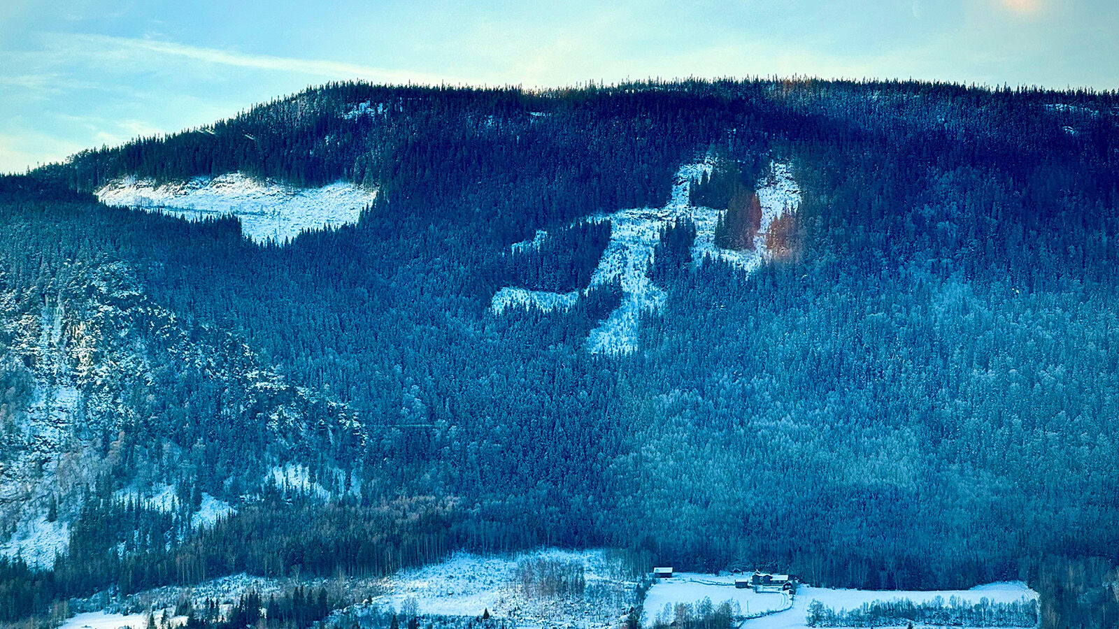 Fakkelmannen is Norwegian for the torchbearer is cut out in the forest north of Lillehammer.