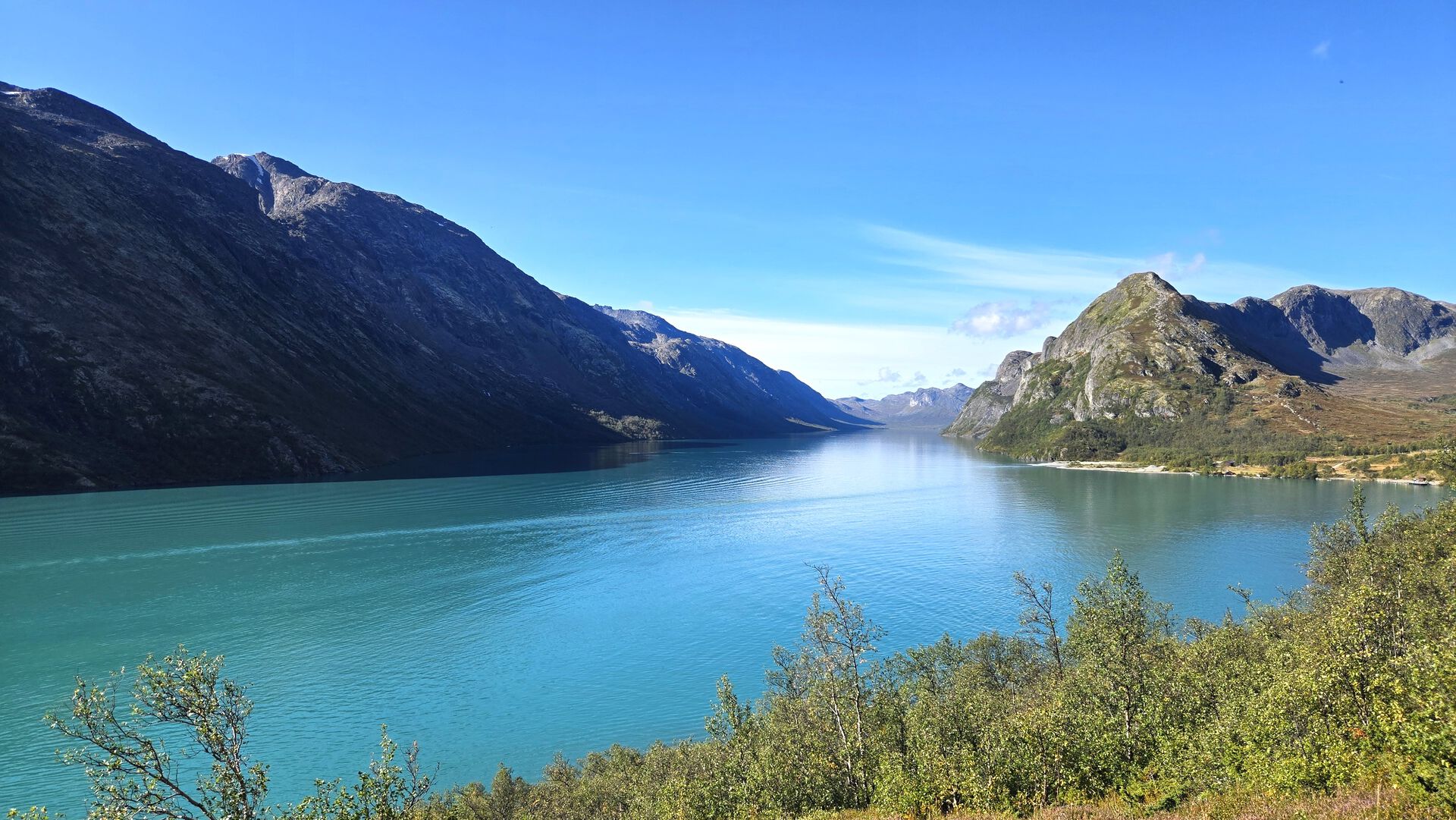 mountains surrounding a lake