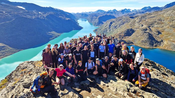 group of students on top of a mountain