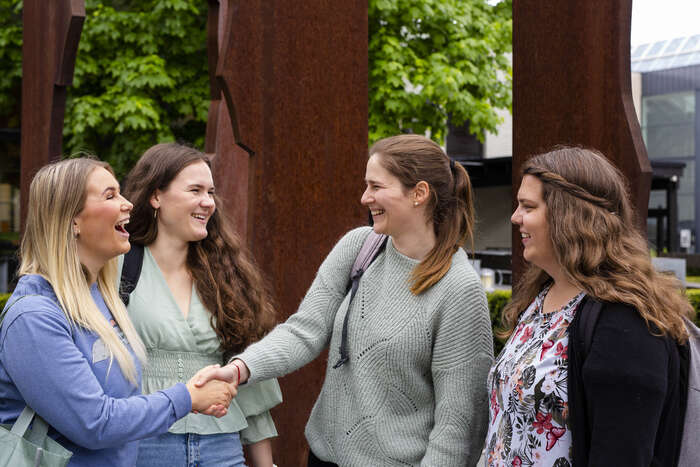 For young women greeting each other