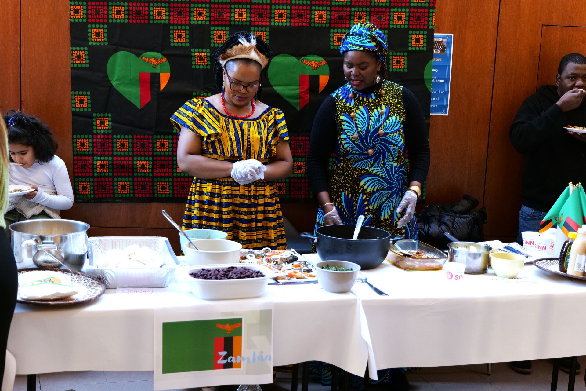 Two Zambian women making food