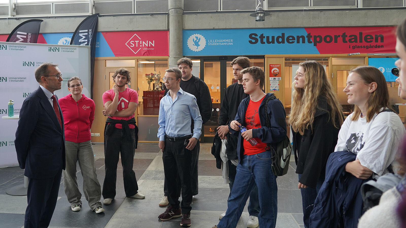 Middle-aged man with students 