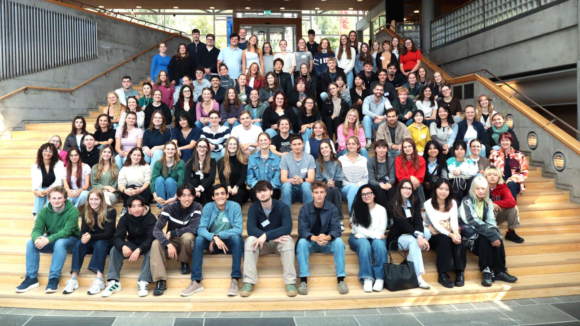 102 students sitting on stairs