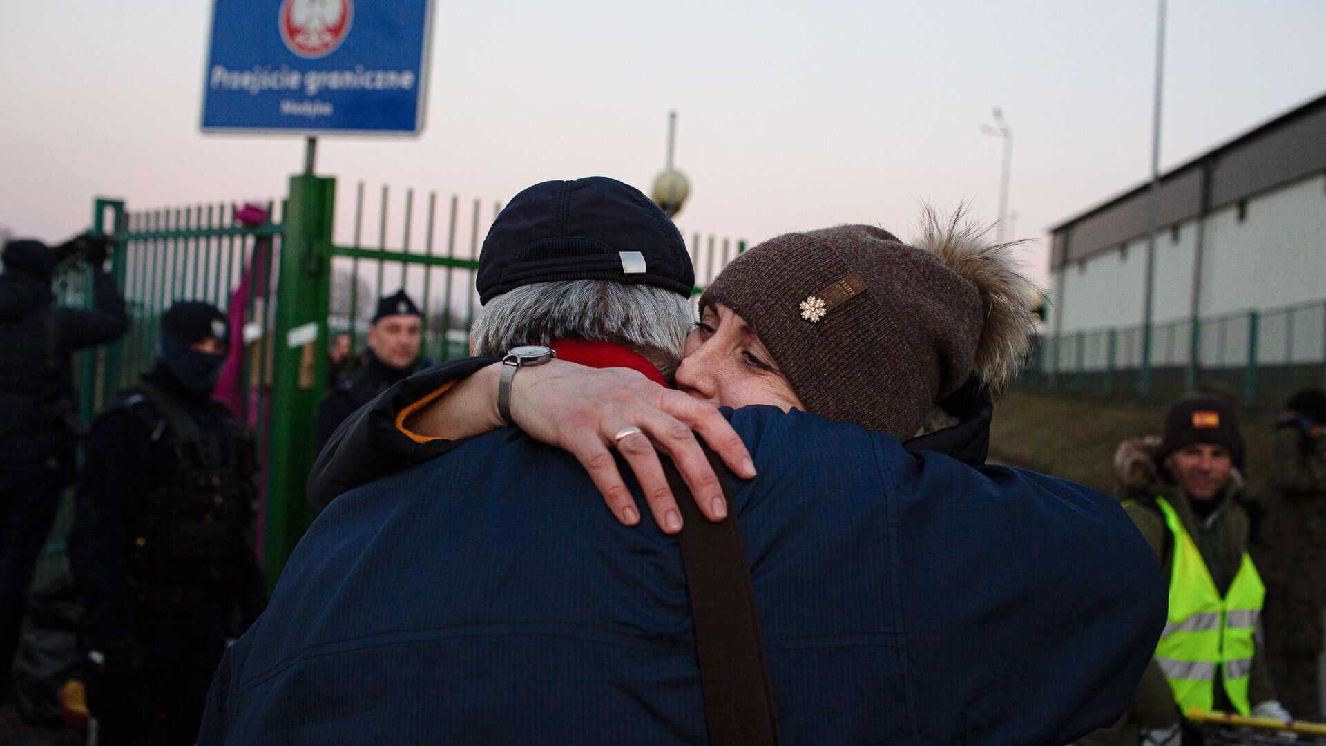 Two people hugging each other 
