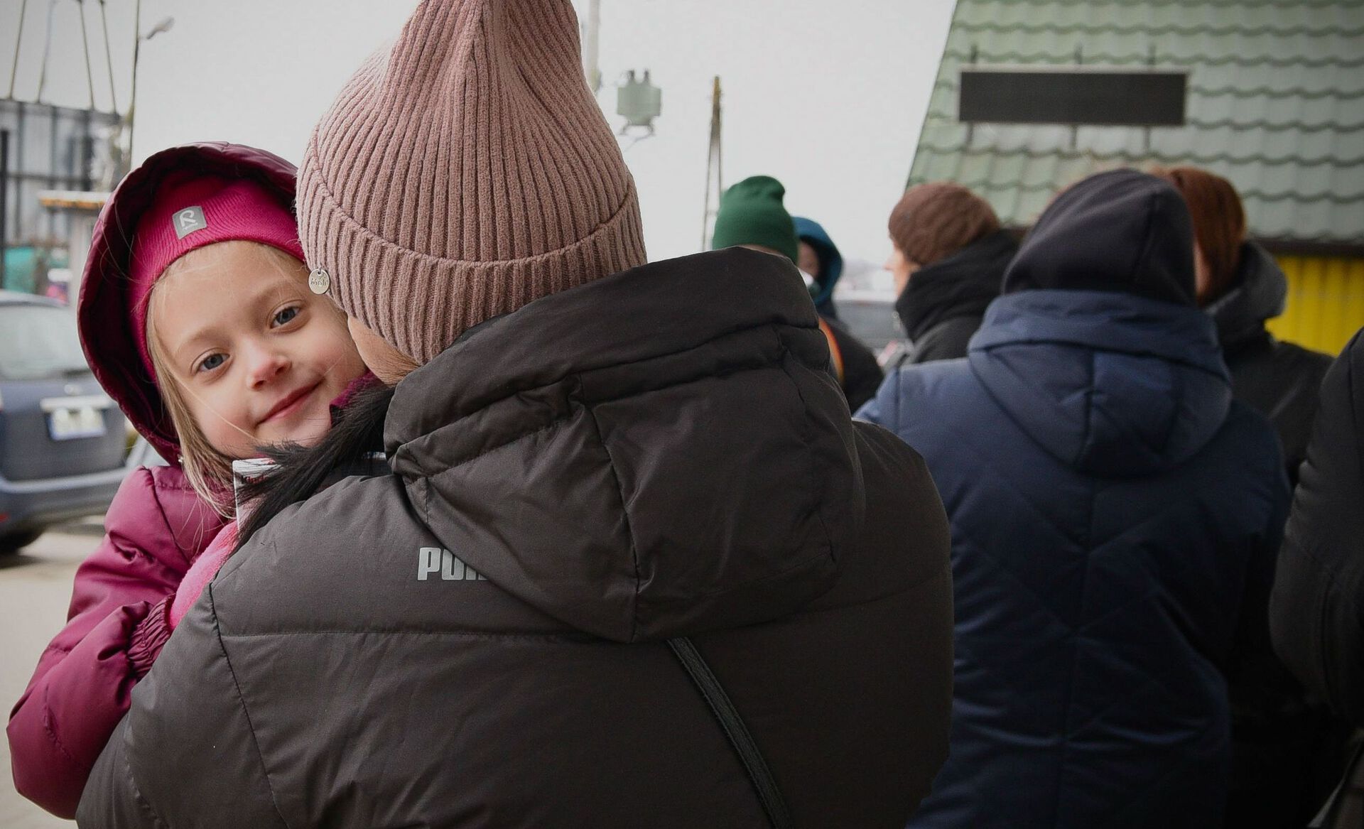 Photo of Agata in her mother's arms