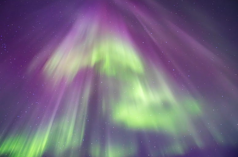 Photo of the Northern ligts, showing variety of colours from purple to green