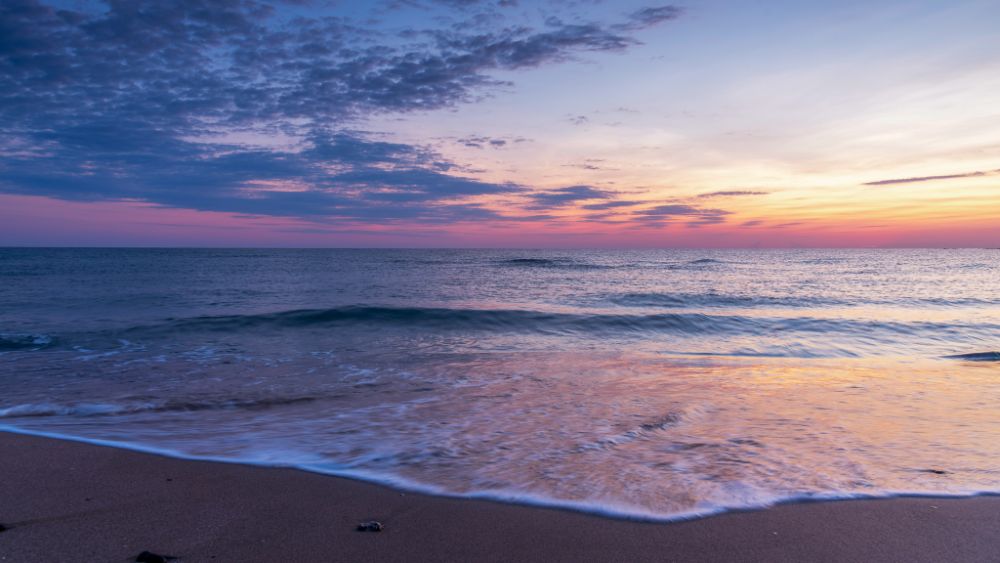 Bilde av strand og hav