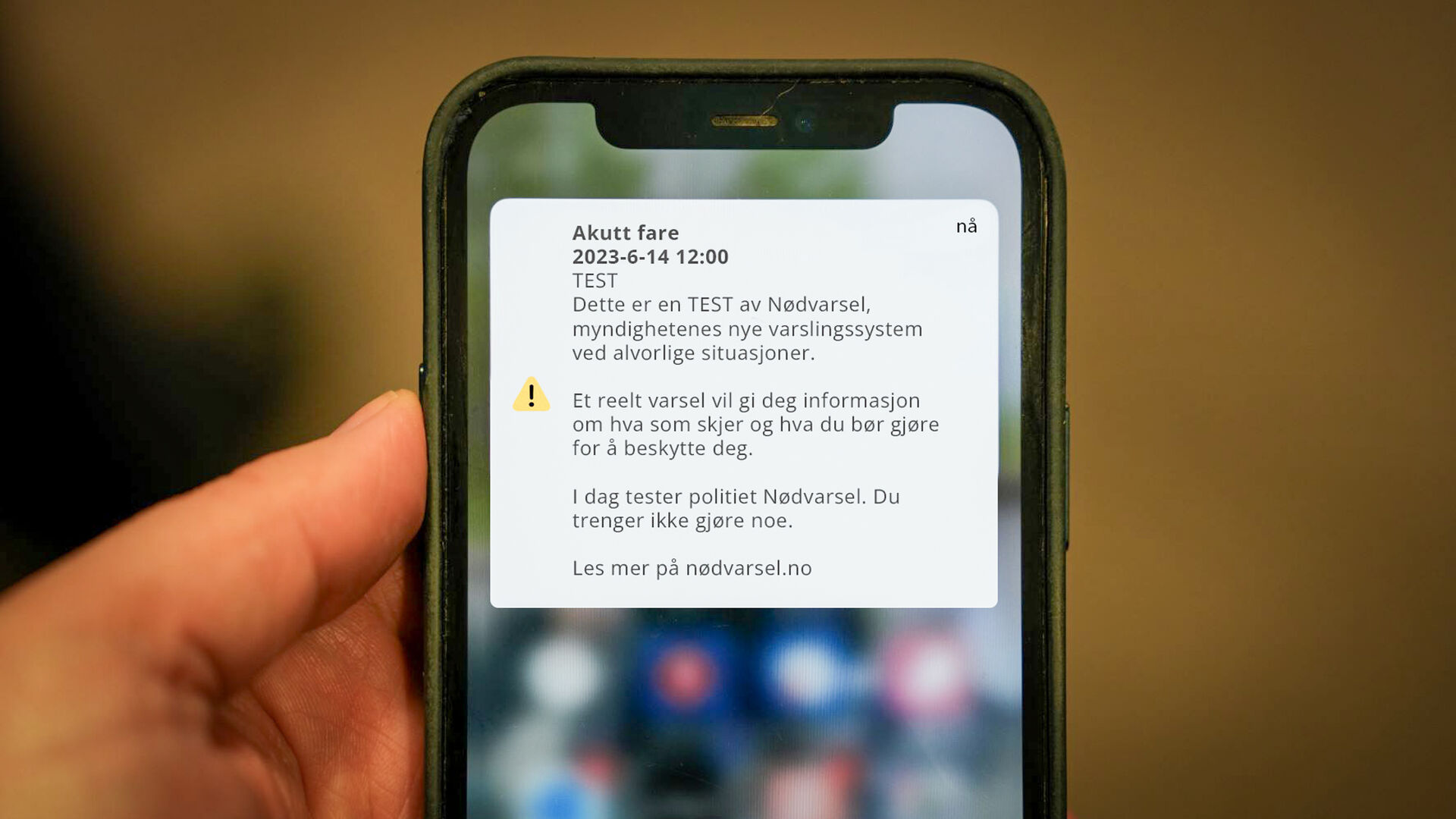 Bilde av en nødvarselmelding på en mobilskjerm