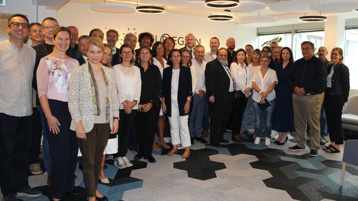 Over 30 people from Emerge are posing together