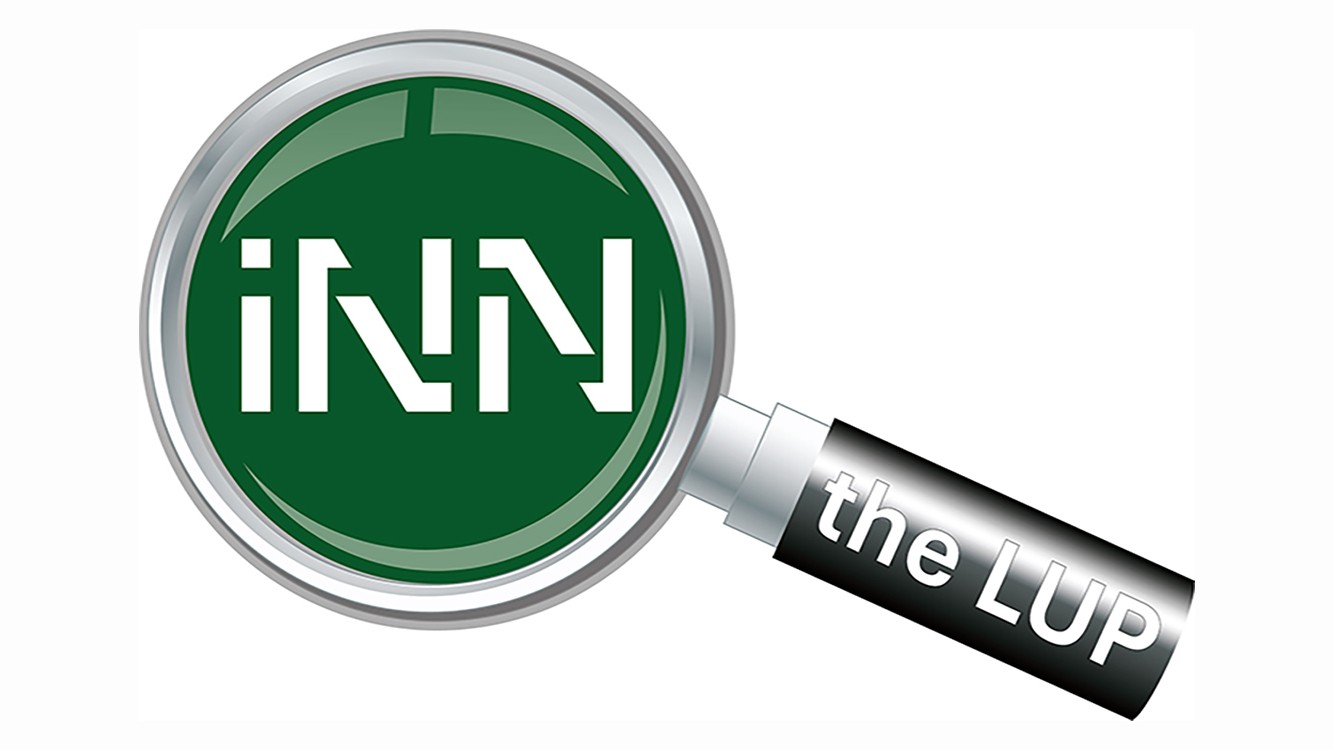Logo, et forstørrelsesglass med teksten INN the LUP