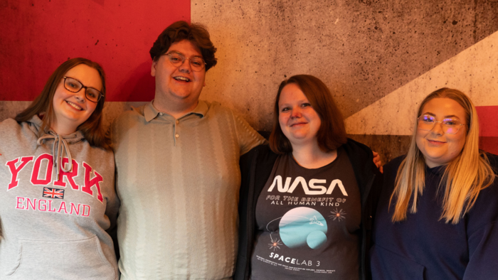 A group photo of the four members of StInn's Executive Committee.